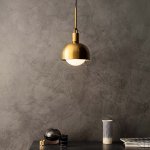 BP_Living_Room_A_LC_21_1_v2_Forked_Shade_Globe_M_Brass_Web-scaled.jpg