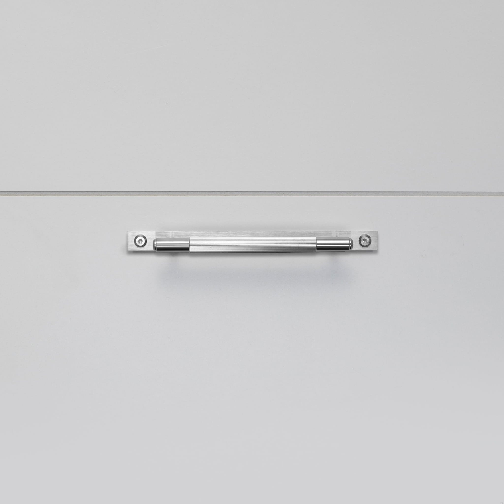 2.BusterPunch_Pull_Bar_Plate_Small_Linear_Steel_Front-scaled.jpg