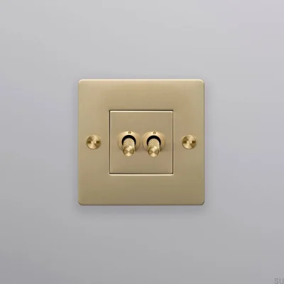 Interrupteur double sans logo Croix 1G Laiton Norme européenne